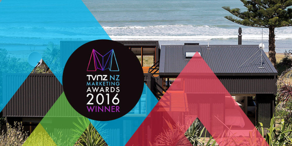 ColorCote house by beach with TVNZ Marketing Awards 2016 logo