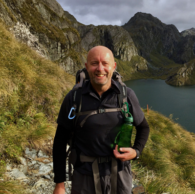 Steve Ballantyne hiking in mountains NZ