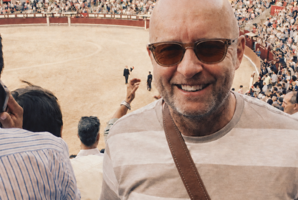 Man in sunglasses at bullfight
